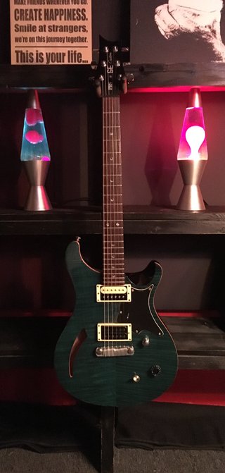 PRS SE semi-hollow modded with one Charvel J90C pickup